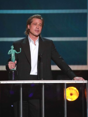 LOS ANGELES, CALIFORNIA - JANUARY 19: Brad Pitt accepts the Outstanding Performance by a Male Actor in a Supporting Role award for 'Once Upon a Time... in Hollywood' onstage during the 26th Annual Screen Actors Guild Awards at The Shrine Auditorium on January 19, 2020 in Los Angeles, California. Rich Fury/Getty Images/AFP