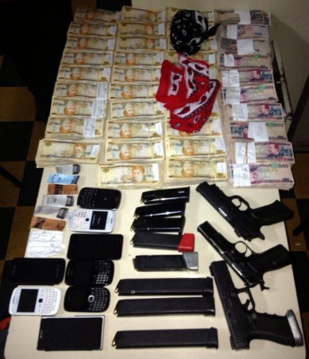 Con parte del botín capturan banda que asaltó banco en Tela