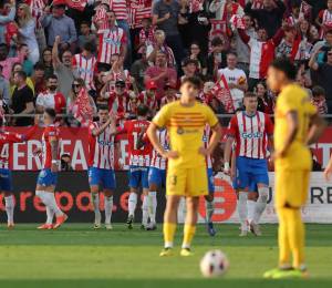 Los jugadores del Girona celebrando el primer gol de Portu contra el Barcelona.