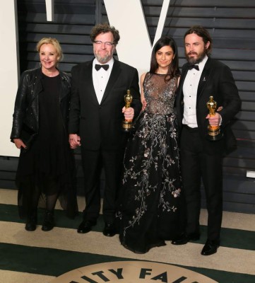 (From L) US actress J. Smith-Cameron, US writer Kenneth Lonergan, US actress Floriana Lima, and US actor Casey Affleck pose as they arrive to the Vanity Fair Party following the 88th Academy Awards at The Wallis Annenberg Center for the Performing Arts in Beverly Hills, California, on February 26, 2017. / AFP PHOTO / JEAN-BAPTISTE LACROIX