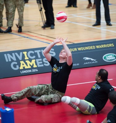 LONDON, ENGLAND - MARCH 6: Prince Harry plays volleyball with wounded Service personnel at the launch of the Invictus Games For Our Wounded Warriors at The Copper Box on March 6, 2014 in London, England. (Photo by Samir Hussein/WireImage)