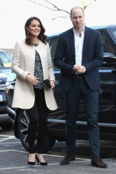 (FILES) In this file photo taken on March 22, 2018 Britain's Prince William, Duke of Cambridge and Britain's Catherine, Duchess of Cambridge gesture on arrival to undertake engagements celebrating the Commonwealth, at a SportsAid event held at the Copperbox Arena in the Olympic Park, in London.<br/>Catherine, the wife of Britain's Prince William, was admitted to hospital in London on April 24, 2018 in the early stages of labour, Kensington Palace announced. / AFP PHOTO / POOL / Chris Jackson