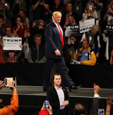SUMTER, SC - FEBRUARY 17: Republican presidential candidate Donald Trump walks onto stage on February 17, 2016 in Sumter, South Carolina. Despite attacks from his fellow candidates about his shifting positions, Trump is still ahead in South Carolina polls only days away from the primary. Spencer Platt/Getty Images/AFP== FOR NEWSPAPERS, INTERNET, TELCOS & TELEVISION USE ONLY ==