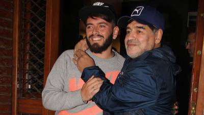 Diego Maradona Jr. y el famoso futolista.