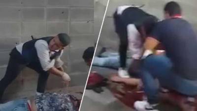 Imágenes del video que circula en redes sociales cuando registran los cadáveres antes que llegue la Policía.