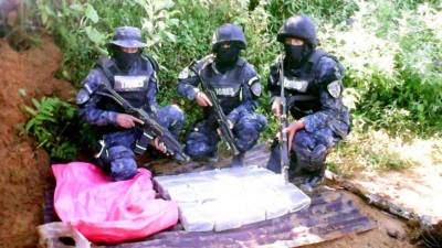 La fotografía muestra el día en que fueron encontrados los $12.5 millones de los Valle.