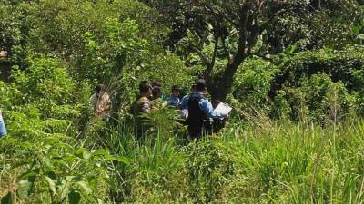 Autoridades policiales encontraron a la mujer en unos potreros de Chamelecón.