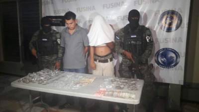 Los detenidos:Luis Fernando Barahona junto al menor de edad.