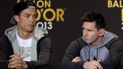 Cristiano Ronaldo junto a Lionel Messi en la previa al Balón de Oro 2013. (Archivo)