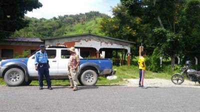 Escena del crimen custodiada por las autoridades de la Policía Nacional de Honduras.