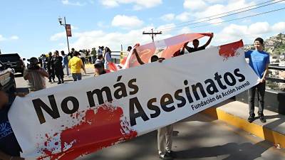 Fotografía de archivo tomada por LA PRENSA de una manifestación contra los crímenes en Honduras.