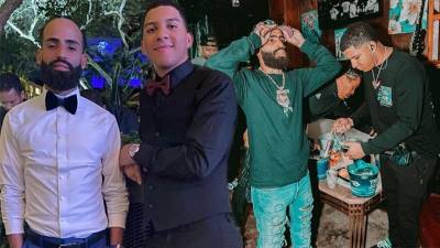 Arcángel junto a su hermano menor Justin Santos Delanda en unas imágenes de archivo.