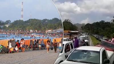 Turistas de diferentes partes del país abarrotan este sábado las playas de Tela, Atlántida, en la zona norte de Honduras.