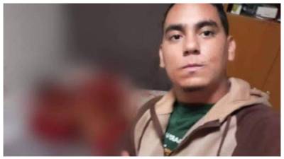 Brayan Aguirre posó con el cadáver de Nelson Cálix.