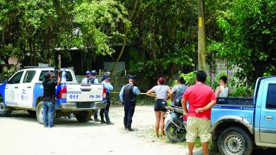 Escena del crimen en una colonia de las partes bajas de la ciudad de San Pedro Sula.