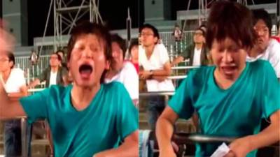 El aficionado japonés llevó una hoja para recordad la letra del himno de River Plate.