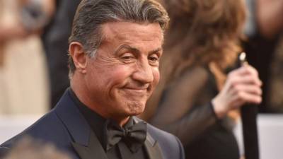 El actor llegó a una sesión de fotos de sus hijas. Foto: AFP