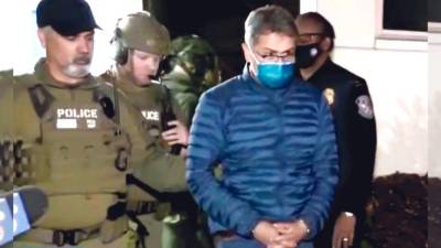 Juan Orlando Hernández durante la noche en que llegó extraditado a Estados Unidos.