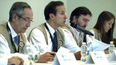 El jefe de la misión de observadores de la OEA, Jorge Quiroga, leyó el documento.