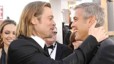 George Clooney y Brad Pitt en una foto de archivo.