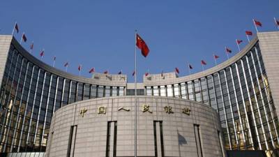 La sede del Banco Popular de China, el banco central del país, en Beijing. La entidad acaba de recortar las tasas de interés.