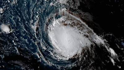 This image obtained from the National Oceanic and Atmospheric Administration shows Hurricane Irma on September 4, 2017, at 2045 UTC.Irma surged to a dangerous Category Four storm Monday as it churned toward the Leeward islands, sparking alarm and alerts from the Caribbean to Florida, which declared an emergency. The National Hurricane Center said at 2100GMT that the storm was packing top sustained winds of 130 mph (215 km/h). 'Additional strengthening is forecast during the next 48 hours,' the center warned. / AFP PHOTO / NOAA/RAMMB / HO / RESTRICTED TO EDITORIAL USE - MANDATORY CREDIT 'AFP PHOTO / NOAA/RAMMB' - NO MARKETING NO ADVERTISING CAMPAIGNS - DISTRIBUTED AS A SERVICE TO CLIENTS