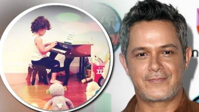 Alejandro Sanz con su pequeño Dylan.