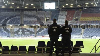 Germany's defender Jonas Hector (L) and Germany's defender Mats Hummels react at the end of the UEFA Nations League football match between Netherlands and Germany, on October 13, 2018 at Johan Crujiff ArenA in Amsterdam. (Photo by EMMANUEL DUNAND / AFP)
