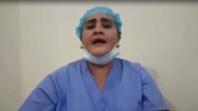 La enfermera Bery Torres del hospital de San Marcos en Ocotepeque canta son sentimiento y afirma que resistirá.
