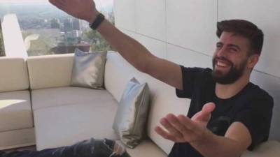 Barcelona's Spanish defender Gerard Pique smiles during the Spanish Copa del Rey (King's Cup) semi-final second leg football match between Real Madrid and Barcelona at the Santiago Bernabeu stadium in Madrid on February 27, 2019. (Photo by OSCAR DEL POZO / AFP)