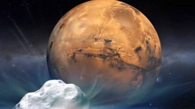 This NASA file image released on November 19, 2018 shows on ancient Mars, water carved channels and transported sediments formING fans and deltas within lake basins. - Examination of spectral data acquired from orbit show that some of these sediments have minerals that indicate chemical alteration by water. Here in Jezero Crater delta, sediments contain clays and carbonates. The image combines information from two instruments on NASA's Mars Reconnaissance Orbiter, the Compact Reconnaissance Imaging Spectrometer for Mars and the Context Camera. NASA has chosen Jezero Crater as the landing site for its upcoming Mars 2020 rover mission after a five year search, during which every available detail of more than 60 candidate locations on the Red Planet was scrutinized and debated by the mission team and the planetary science community. (Photo by HO / NASA / AFP) / RESTRICTED TO EDITORIAL USE - MANDATORY CREDIT 'AFP PHOTO / NASA/JPL-CALTECH/MSSS/JHU-APL' - NO MARKETING NO ADVERTISING CAMPAIGNS - DISTRIBUTED AS A SERVICE TO CLIENTS