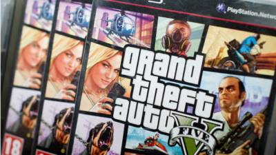 A health worker walks to care a patient infected with the novel coronavirus as he is transferred to another building after the IGSS Hospital General de Enfermedades (General Hospital for Diseases) overcrowded with COVID-19 patients, in Guatemala City on July 13, 2020. - Doctors, deputies and the Human Rights Procurators Office (PDH) have raised the alarm about the imminent collapse of Guatemala's health system due to the increase of COVID-19 cases. (Photo by Johan ORDONEZ / AFP)