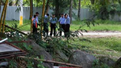 Soldiers wearing armbands for Mexico's National Guard man a temporary immigration checkpoint searching northbound vehicles for migrants, just north of Ciudad Cuauhtemoc, Chiapas State, Mexico, Saturday, June 15, 2019. Under pressure from the U.S. to slow the flow of migrants north, Mexico plans to deploy thousands of National Guard troops by Tuesday to its southern border region.(AP Photo/Rebecca Blackwell)