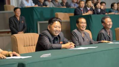North Korean leader Kim Jong Un (R) and South Korean President Moon Jae-in (L) gesture as they watch the large-scale gymnastic and artistic performance at the May Day Stadium in Pyongyang on September 19, 2018, after their summit.North Korea's Kim Jong Un agreed to make a historic visit to Seoul soon and close a missile testing site in front of international inspectors at a summit with the South's President Moon Jae-in in Pyongyang on September 19. / AFP PHOTO / Pyeongyang Press Corps / - / RESTRICTED TO EDITORIAL USE - MANDATORY CREDIT 'AFP PHOTO / Pyeongyang Press Corps' - NO MARKETING NO ADVERTISING CAMPAIGNS - DISTRIBUTED AS A SERVICE TO CLIENTS