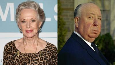 La actriz estadounidense Tippi Hedren y el cineasta británico Alfred Hitchcock.