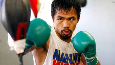 El boxeador Manny Pacquiao hace campaña con la Biblia en un bolsillo en una línea extremadamente conservadora.