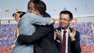 Iniesta y Xavi han tenido grandes momentos en el Barcelona.