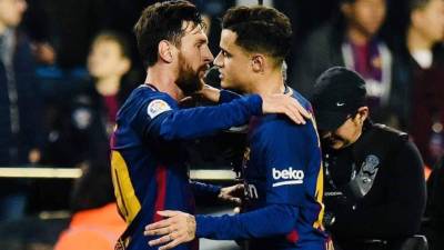 Coutinho y Messi celebrando un gol del Barcelona.