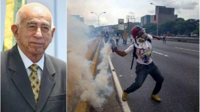 A demonstrator throws a molotov cocktail in clashes with the security forces at the Francisco de Paula Santander international bridge Bridge linking Cucuta, Colombia, and Urena, Venezuela, during an attempt to cross humanitarian aid over the border into Venezuela, on February 23, 2019. - US-donated humanitarian aid was 'on its way' to Venezuela, opposition leader Juan Gauido announced Saturday as he launched a distribution operation with the presidents of Colombia, Chile and Paraguay. (Photo by RAUL ARBOLEDA / AFP)