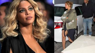 La cantante habría sido captada tapándose el área del vientre.