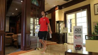 Members of the Royal Canadian Mounted Police (RCMP) tactical unit confer after the suspect in a deadly shooting rampage was neutralized at the Big Stop near Elmsdale, Nova Scotia, Canada, on April 19, 2020. - A gunman killed at least 10 people in an overnight shooting rampage across rural Nova Scotia, before being found dead following an hours-long manhunt, Canadian federal police said April 19. Earlier identified as 51-year-old Gabriel Wortman, the suspect had been on the run since Saturday night, when police were alerted to shots being fired in the small community of Portapique, around 100 kilometers (60 miles) from Halifax, capital of the Atlantic province. (Photo by tim krochak / AFP)