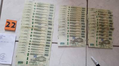 Los agentes de la Atic encontraron dinero falso en los locales que allanaron en Tegucigalpa, San Pedro Sula y Catacamas.