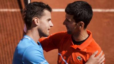NEW YORK, NEW YORK - SEPTEMBER 13: Dominic Thiem of Austria celebrates with championship trophy after winning in a tie-breaker during his Men's Singles final match against Alexander Zverev of Germany on Day Fourteen of the 2020 US Open at the USTA Billie Jean King National Tennis Center on September 13, 2020 in the Queens borough of New York City. Matthew Stockman/Getty Images/AFP