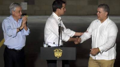 El líder de la oposición de Venezuela, Juan Guaidó, el presidente chileno Sebastián Piñera y el presidente colombiano Iván Duque. Foto: AFP