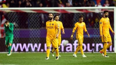Los jugadores del Barcelona tristes por la eliminación de la Champions League.