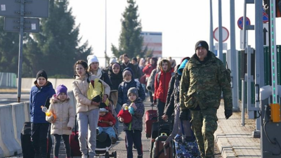 Ucranianos huyendo de su país.