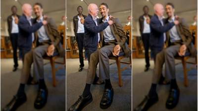 Georg Wessels abraza al turco Sultan Kösen, que con 2.5 metros de estatura es el hombre más alto del mundo.