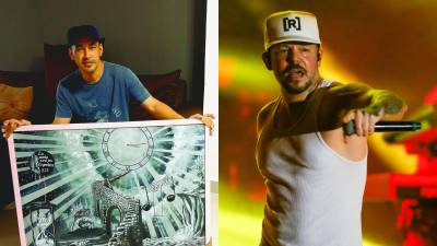 Eduardo Valle Varela posa con la pintura que realizó en honor a la canción “313”, de Residente.