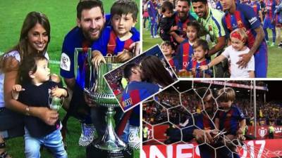 Los jugadores del FC Barcelona celebraron en familia la obtención de la Copa del Rey lograda en el estadio Vicente Calderón ante el Deportivo Alavés. El césped se llenó de niños y parejas de los futbolistas.