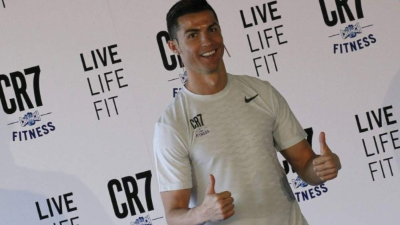 Cristiano sonriendo ante la prensa que se hizo presente a la inauguración. Foto EFE.